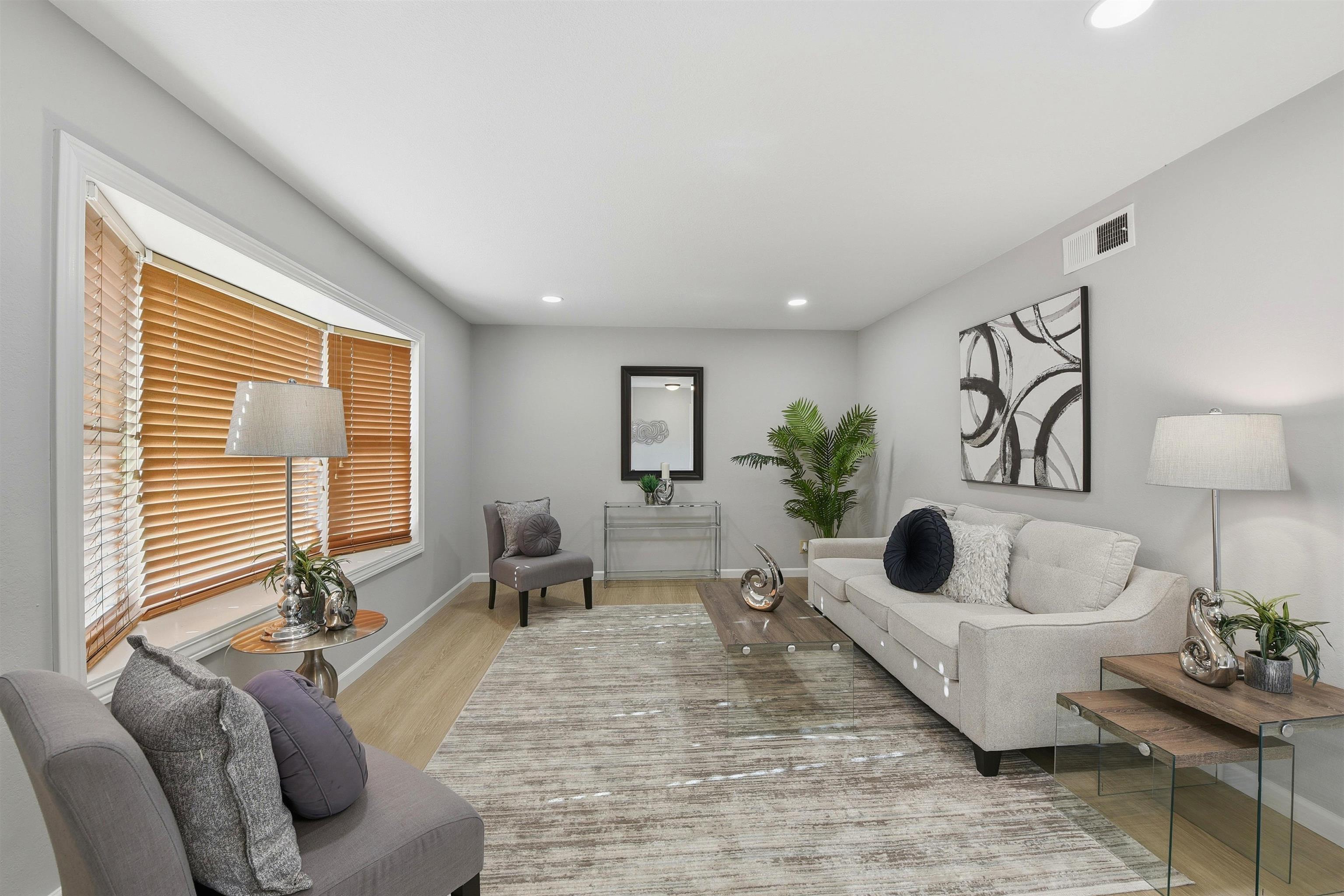 37768 Rockspray Street Newark, CA 94560 - Photo 4 of 34 a living room with furniture and a window