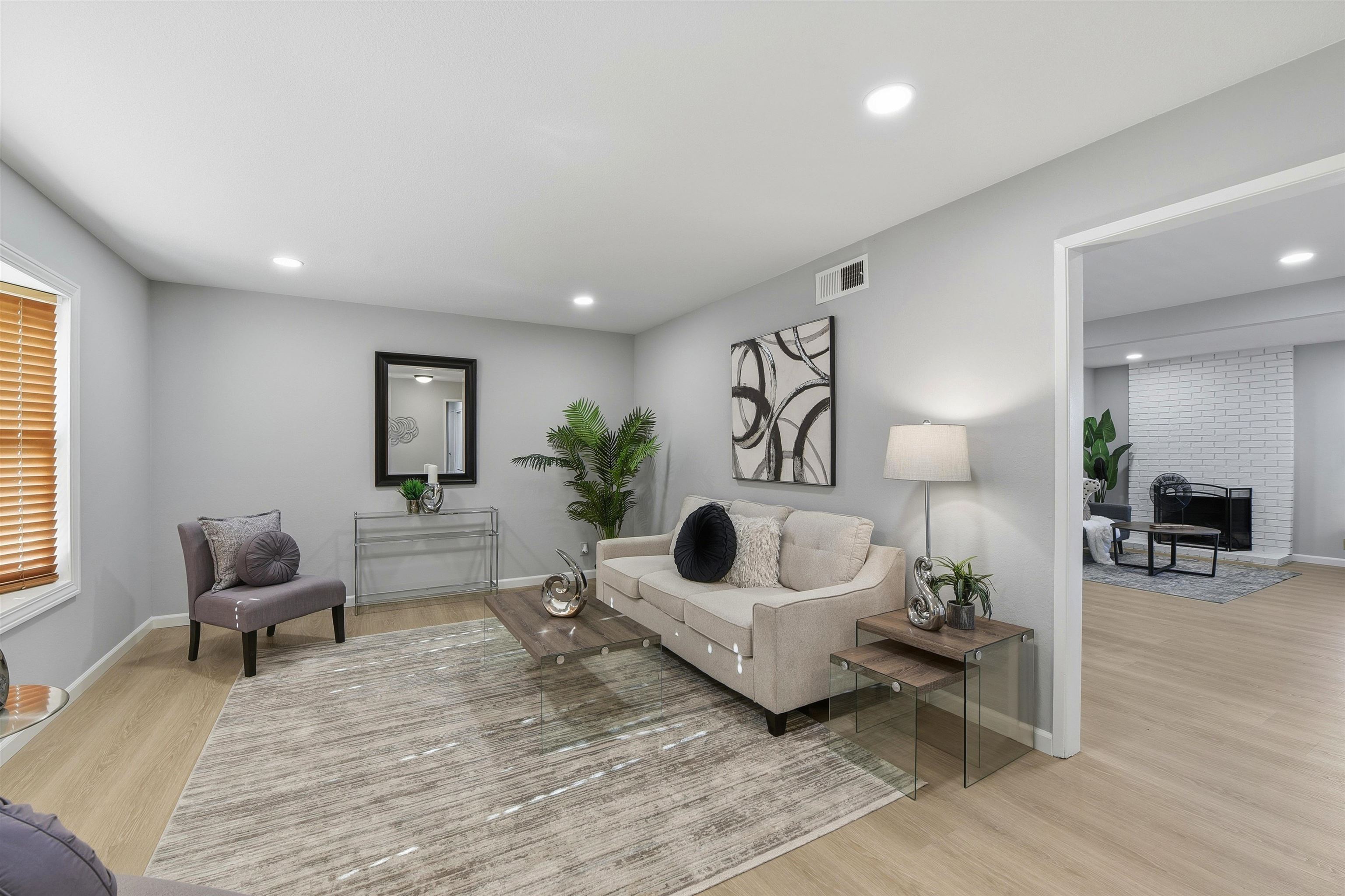 37768 Rockspray Street Newark, CA 94560 - Photo 5 of 34 a living room with furniture and a wooden floor