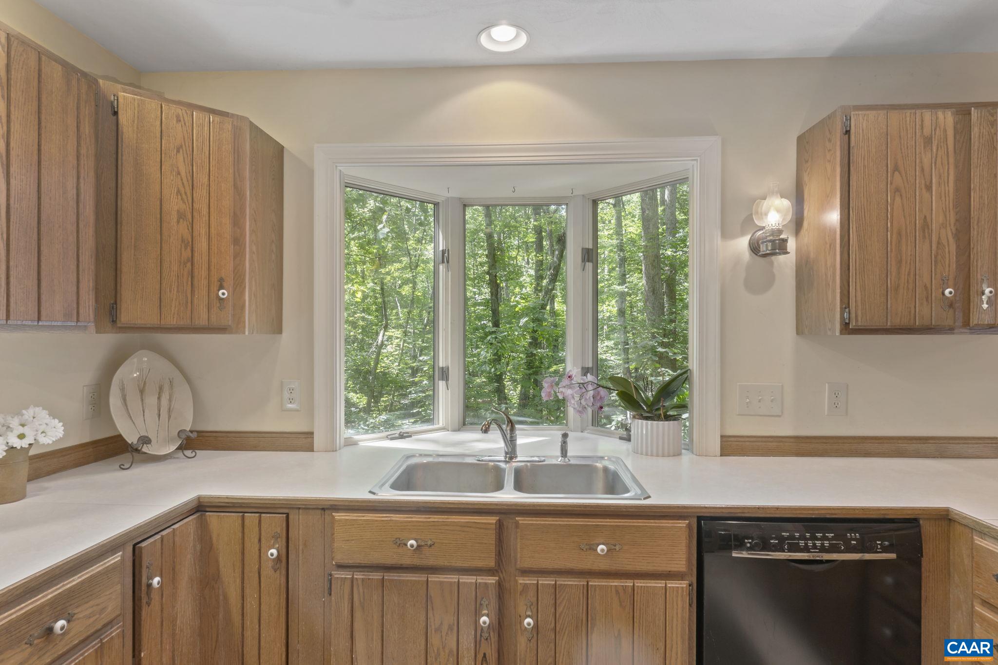 2 Whippoorwill Lane Palmyra, VA 22963 - Photo 9 of 36 a kitchen with a sink and a window