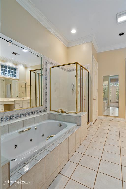 330 Pierremont Road, Unit 1 Shreveport, LA 71106 - Photo 13 of 21 a bathroom with a bathtub and a shower