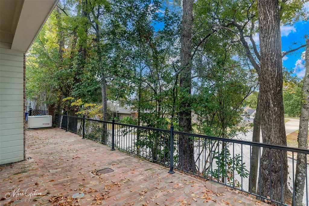 330 Pierremont Road, Unit 1 Shreveport, LA 71106 - Photo 21 of 21 a view of a balcony with trees