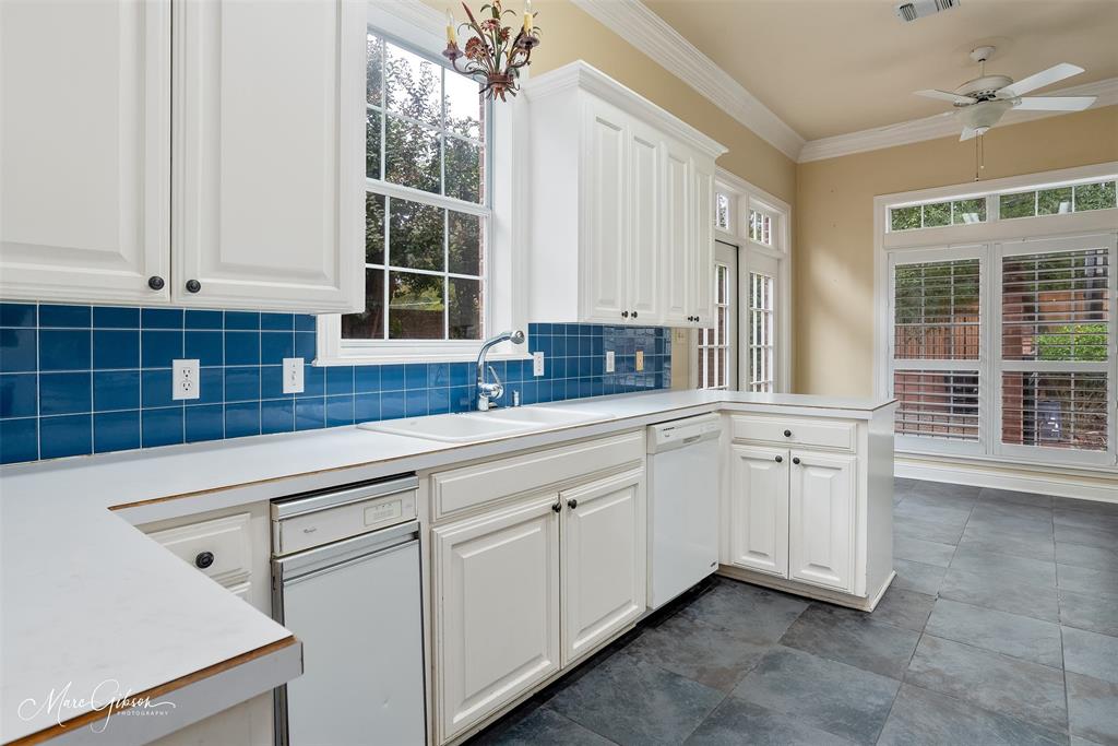 330 Pierremont Road, Unit 1 Shreveport, LA 71106 - Photo 7 of 21 a kitchen with granite countertop white cabinets and a sink