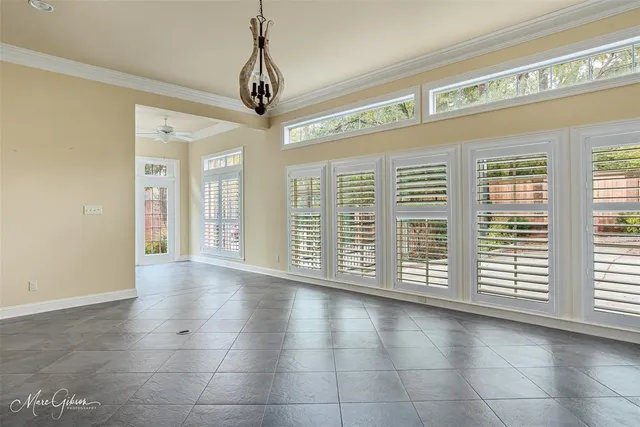 a view of empty room with windows