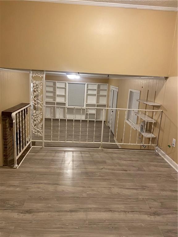 3883 Grand Pines Drive Decatur, GA 30034 - Photo 4 of 4 a view of an empty room with wooden floor
