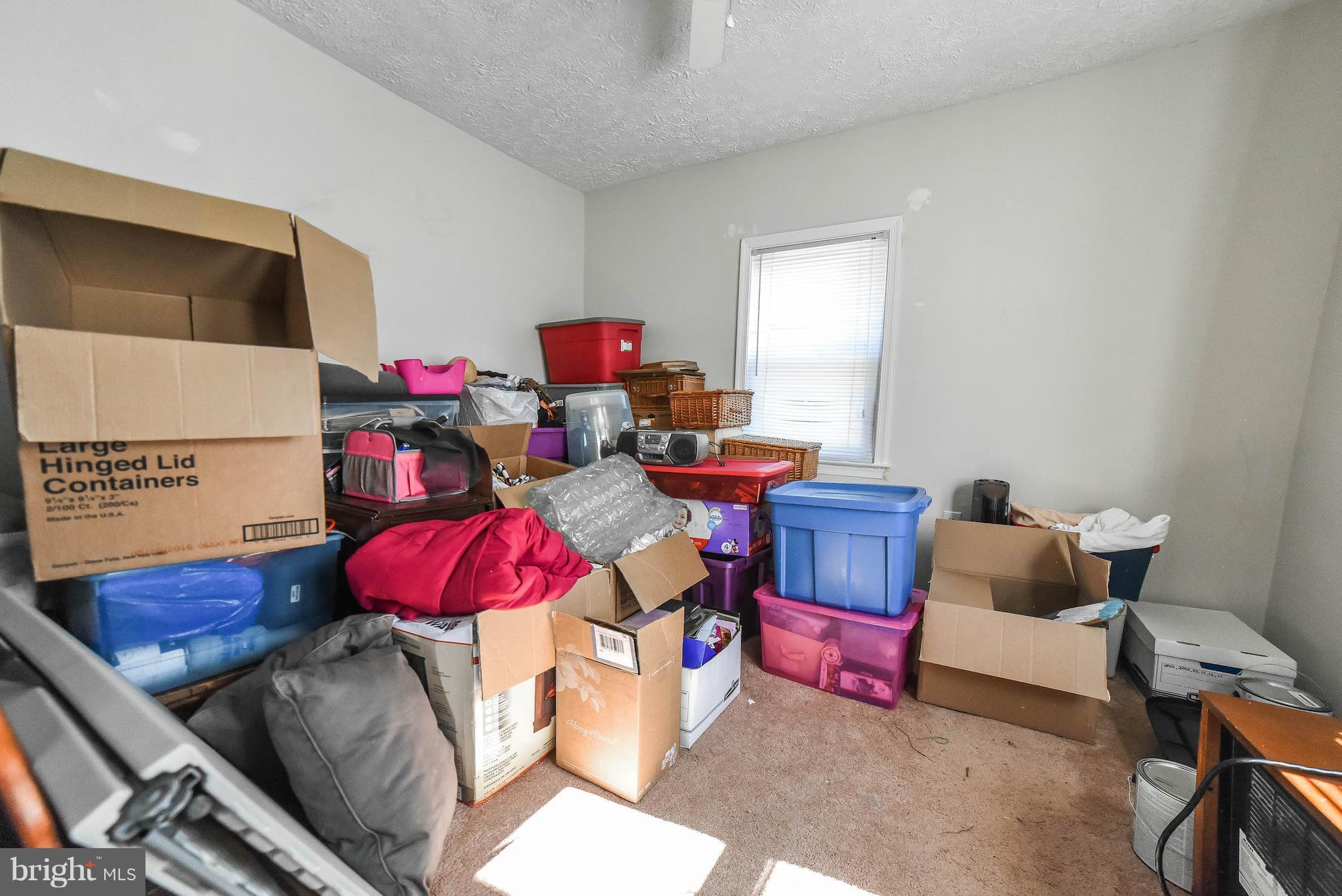 14977 Rock Point Road Newburg, MD 20664 - Photo 14 of 18 Nice sized bedroom - excuse the mess!!