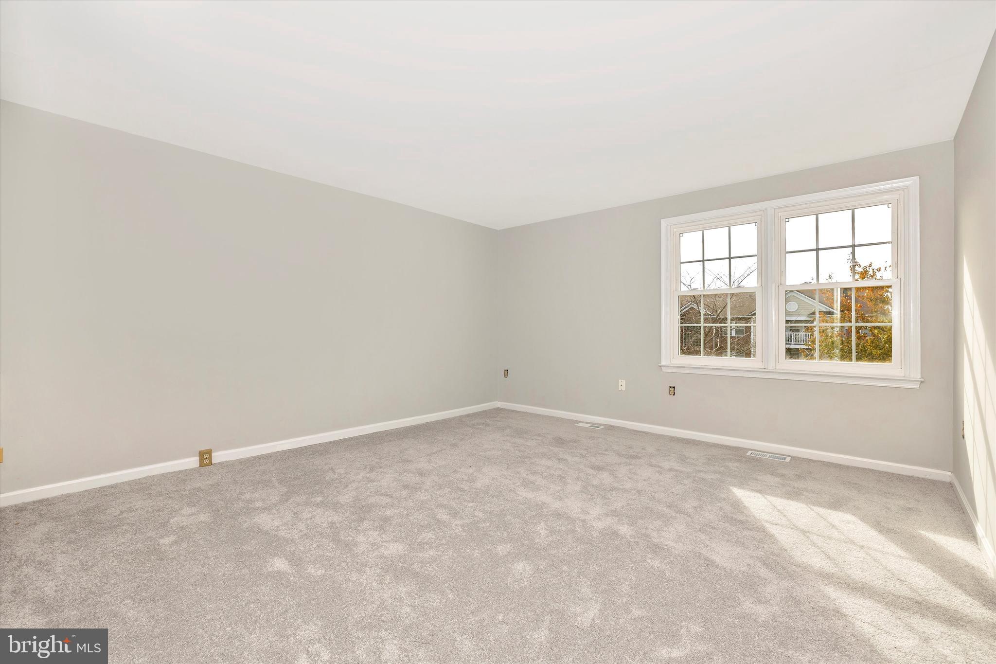 8001 Hollow Reed Court Frederick, MD 21701 - Photo 21 of 33 an empty room with a window