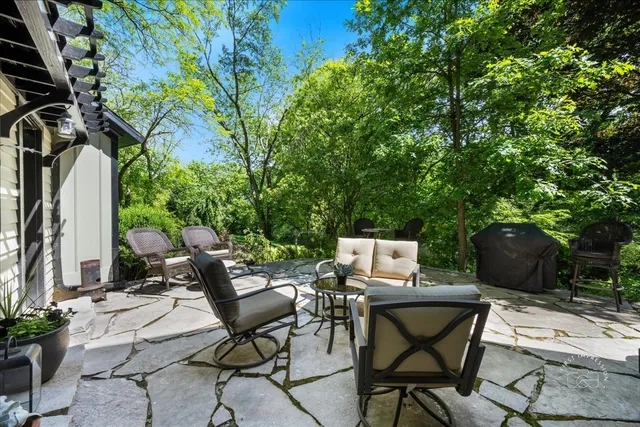 a view of a tables and chairs in patio