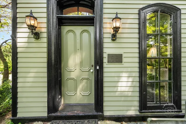 a view of a door of the house with a door