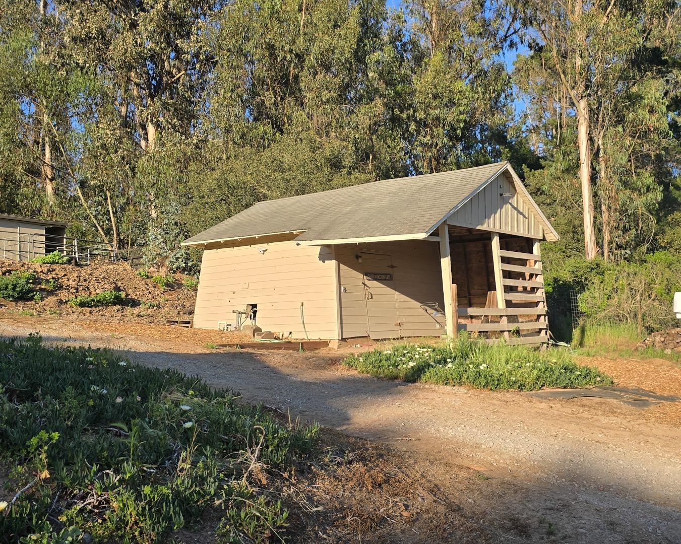 17329 McGuffie Road Salinas, CA 93907 - Photo 19 of 27 a front view of a house with a yard and garage