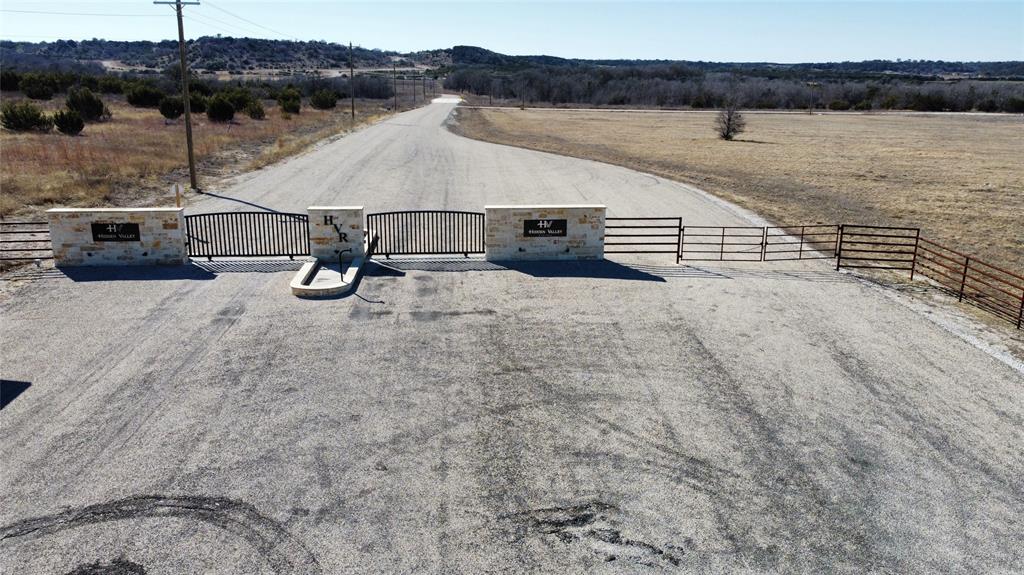 1295 Valley Ranch Road Glen Rose, TX 76043 - Photo 7 of 7 a view of residential houses with outdoor space
