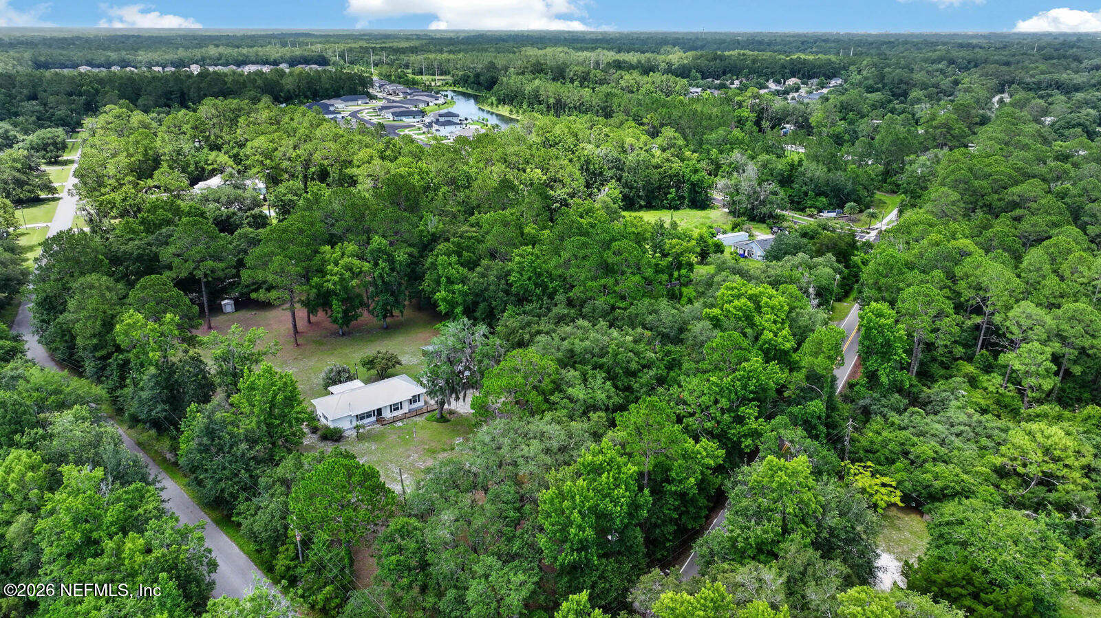 1950 Lightsey Road St. Augustine, FL 32084 - Photo 50 of 57 an aerial view of a house with a yard