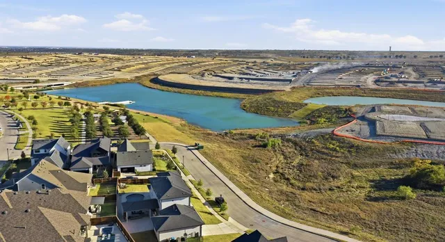 a view of a ocean with a nearby beach