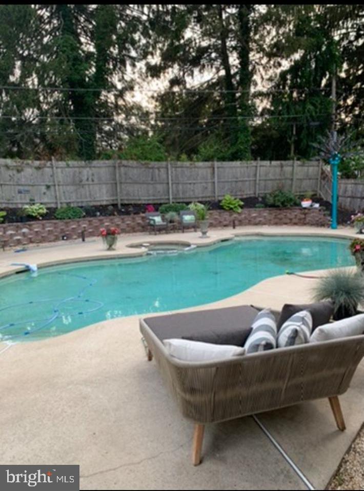 2606 Springfield Road Broomall, PA 19008 - Photo 29 of 32 a view of outdoor sitting area with furniture and garden