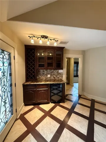 a bathroom with a sink and a large mirror