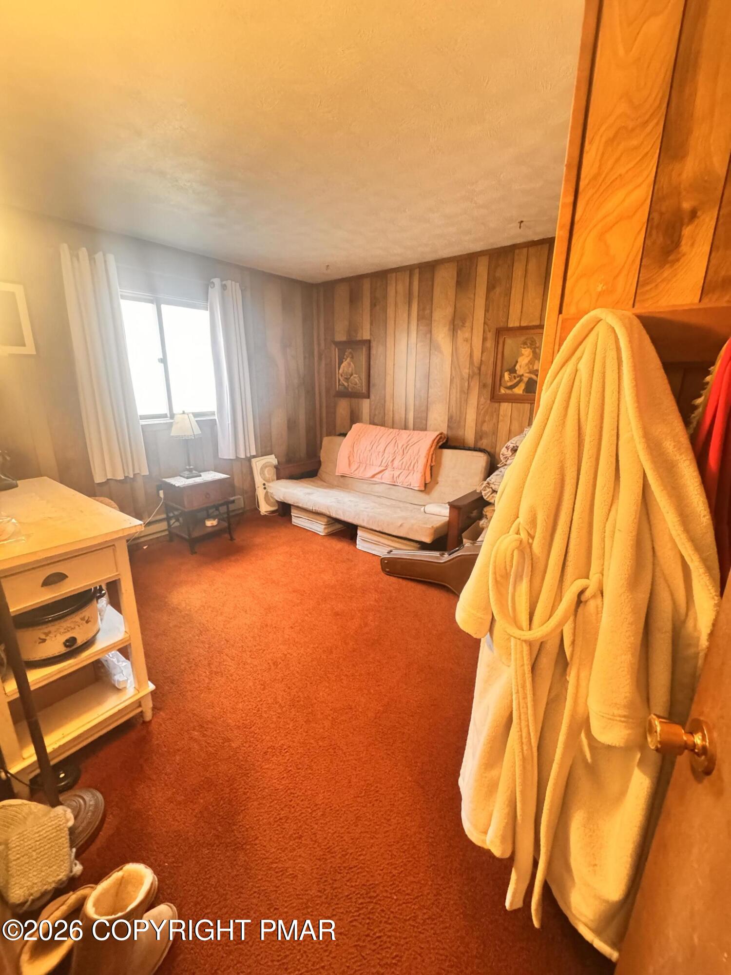 166 Dover Drive Bushkill, PA 18324 - Photo 13 of 21 a bedroom with a bed and wooden floor