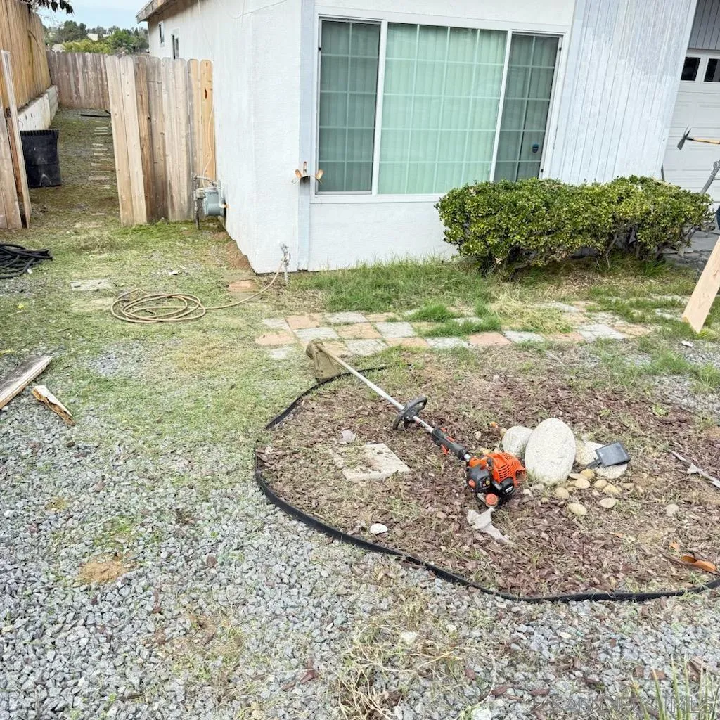 a view of a backyard with of cabin