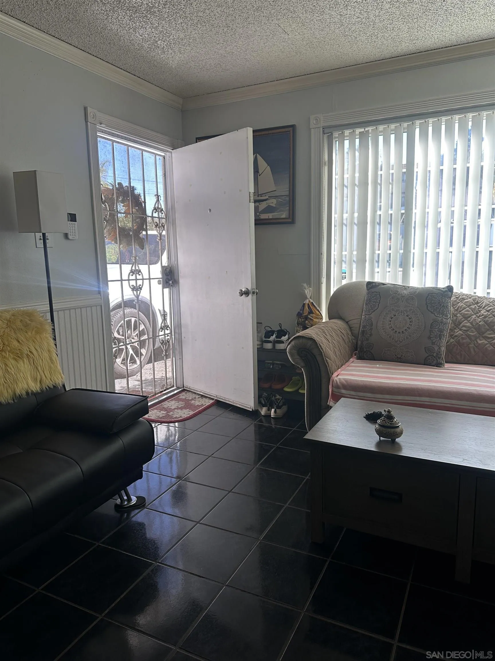 1046 Bartlett Drive Vista, CA 92084 - Photo 2 of 12 a living room with furniture and a window