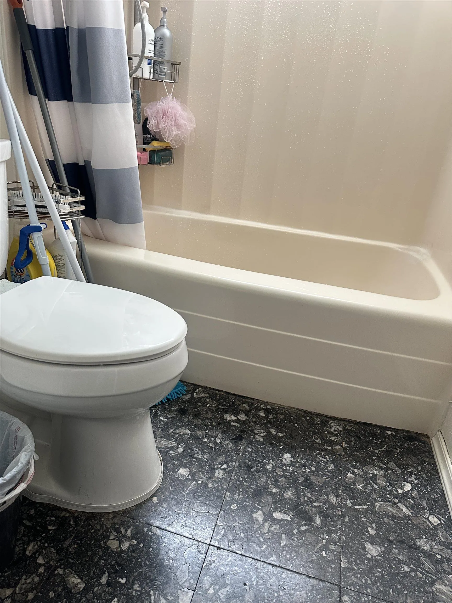 1046 Bartlett Drive Vista, CA 92084 - Photo 6 of 12 a bathroom with a toilet and a bathtub