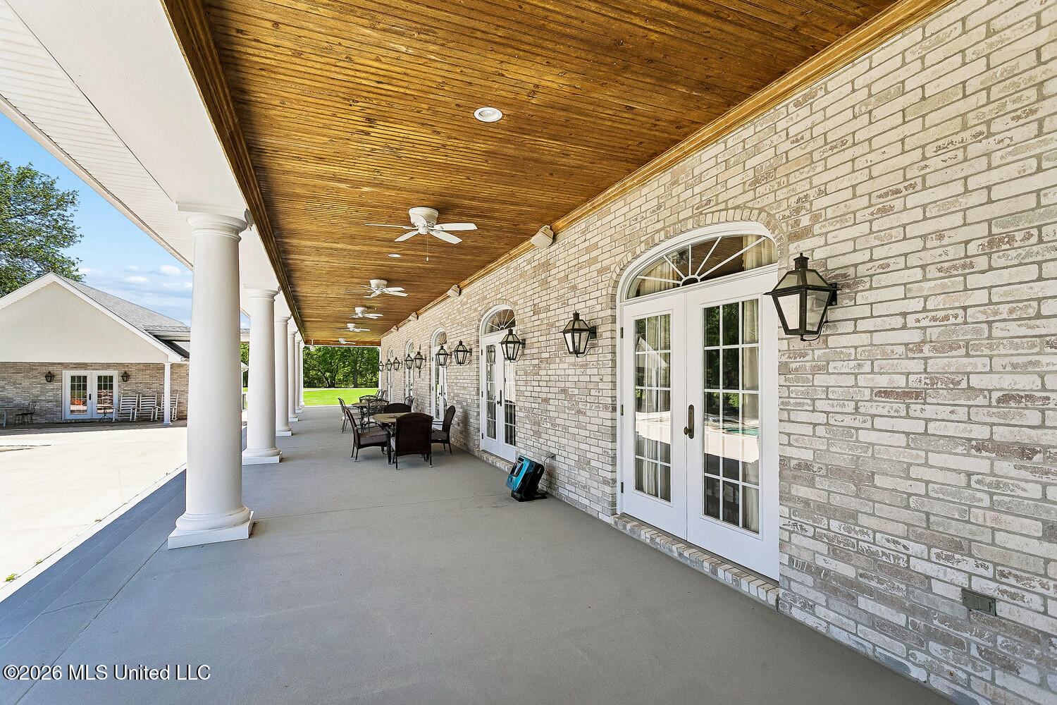 242 Carey Byrd Road Carriere, MS 39426 - Photo 45 of 65 Wrap-around verandah