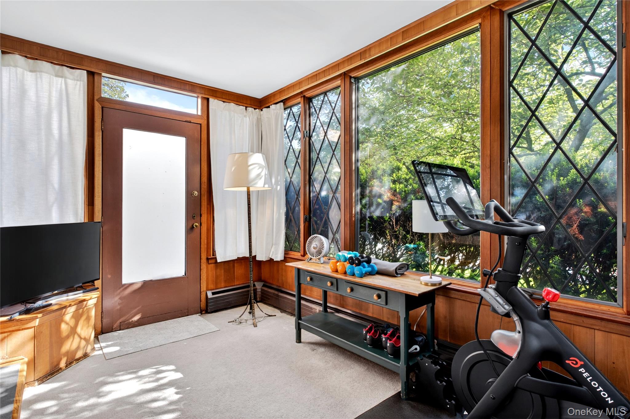 142 Mill Spring Road Manhasset, NY 11030 - Photo 7 of 23 a room with lots of furniture and equipment