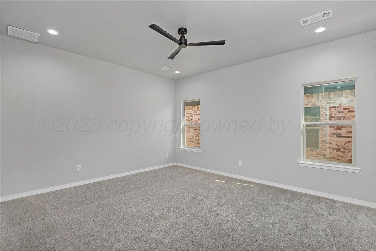 4300 Beacon Road Amarillo, TX 79118 - Photo 12 of 20 a view of an empty room with a window