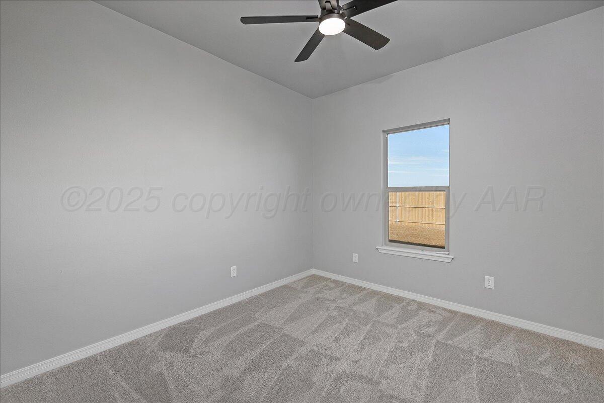 4300 Beacon Road Amarillo, TX 79118 - Photo 15 of 20 an empty room with a window