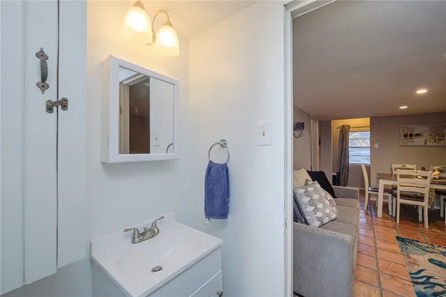 a backyard of a house with outdoor seating