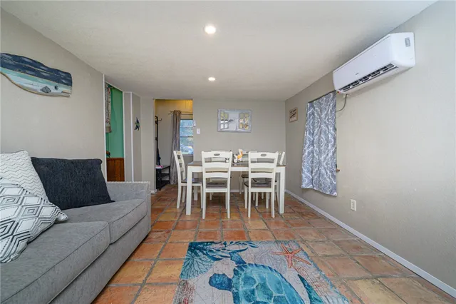 a outdoor living space with furniture and a umbrella