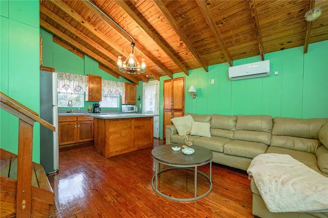 a view of a living room with a large window