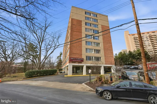 a car parked in front of a building