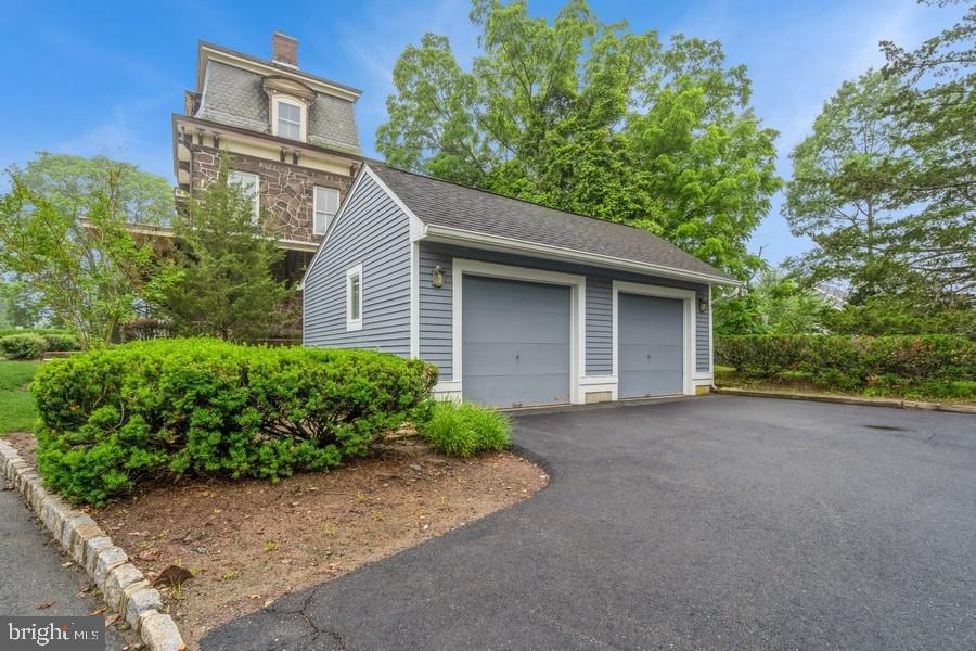 16 Railroad Place Pennington, NJ 08534 - Photo 12 of 14 front view of a house with a street