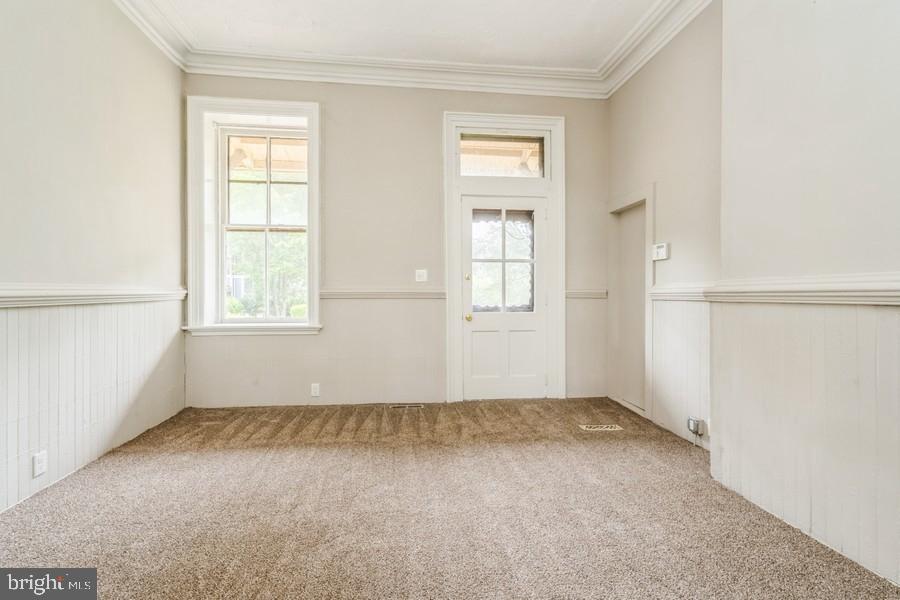 16 Railroad Place Pennington, NJ 08534 - Photo 7 of 14 an empty room with windows