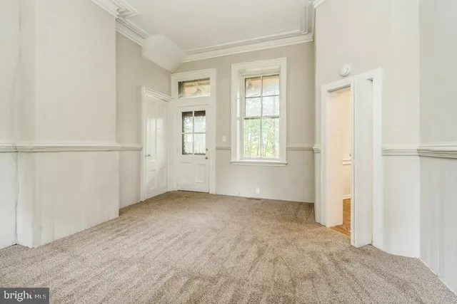 an empty room with windows