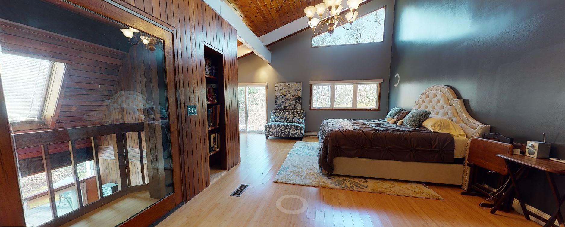 149 Wheeler Road Mashpee, MA 02649 - Photo 18 of 41 a bedroom with furniture and a window