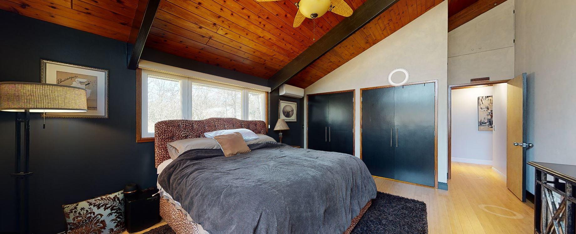 149 Wheeler Road Mashpee, MA 02649 - Photo 26 of 41 a bed room with a bed and a dresser