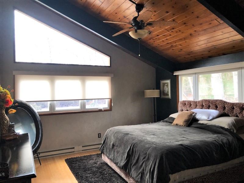 149 Wheeler Road Mashpee, MA 02649 - Photo 27 of 41 a bedroom with a bed and window