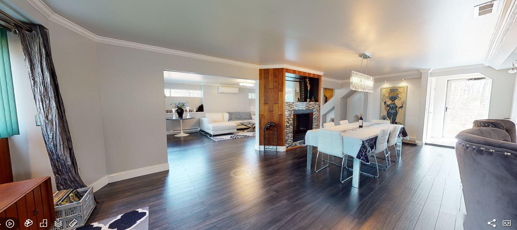 149 Wheeler Road Mashpee, MA 02649 - Photo 4 of 41 a view of a dining room with furniture and wooden floor