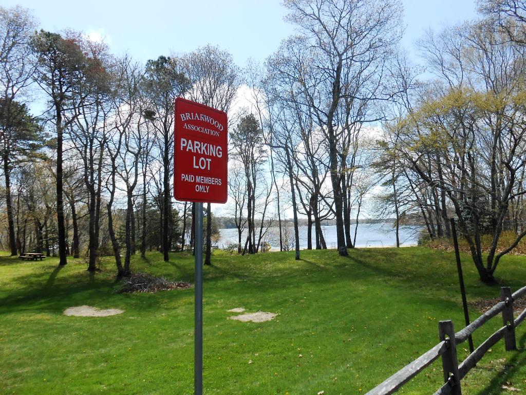 149 Wheeler Road Mashpee, MA 02649 - Photo 39 of 41 a sign board on the side of the house