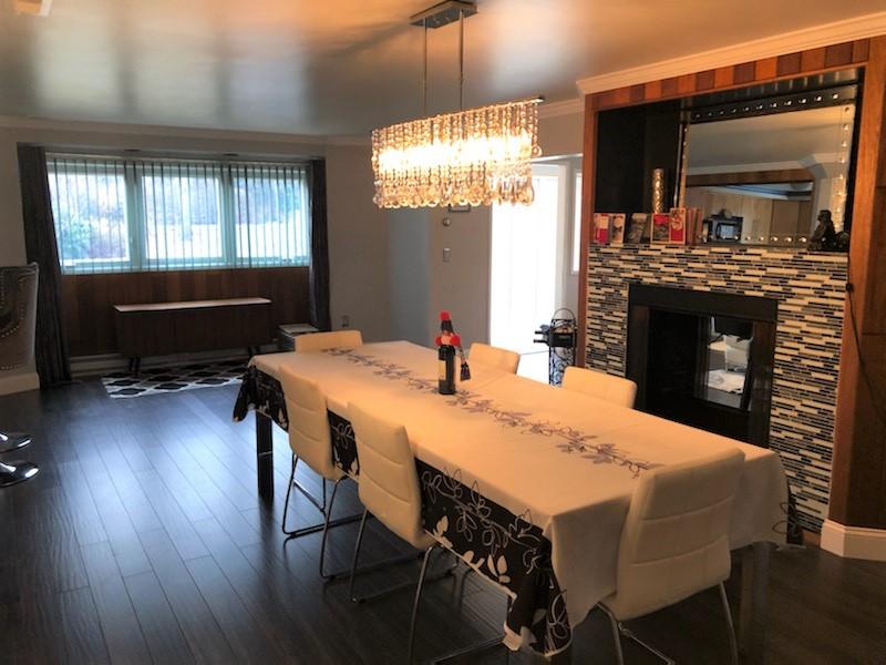 149 Wheeler Road Mashpee, MA 02649 - Photo 8 of 41 a view of a dining room with furniture window and wooden floor