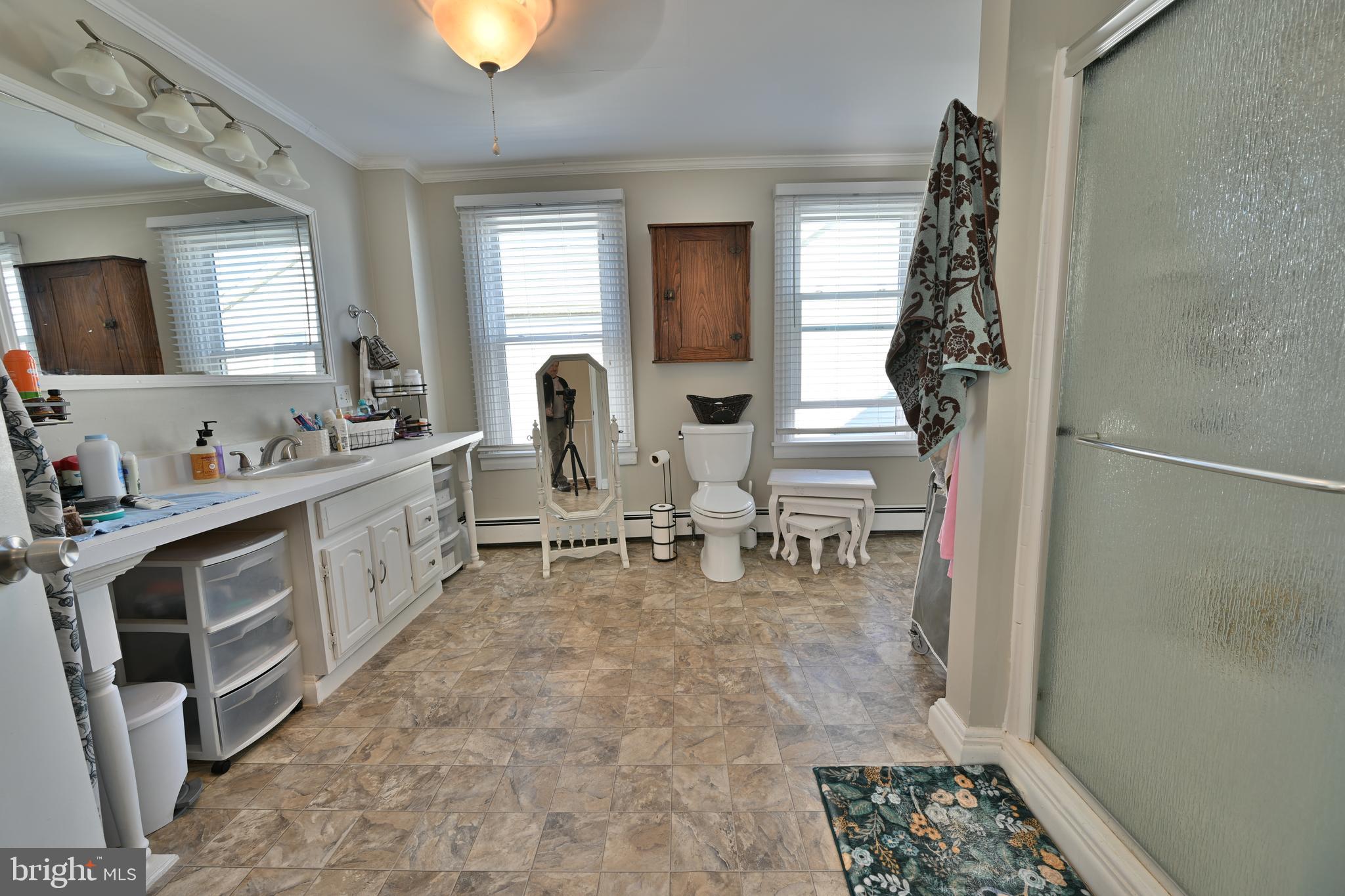 24734 East Main Street Columbus, NJ 08022 - Photo 14 of 24 a living room with furniture and a dining table