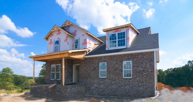 780 Grays Chapel Road Southside, TN 37171 - Photo 1 of 30 a front view of house with a yard and balcony