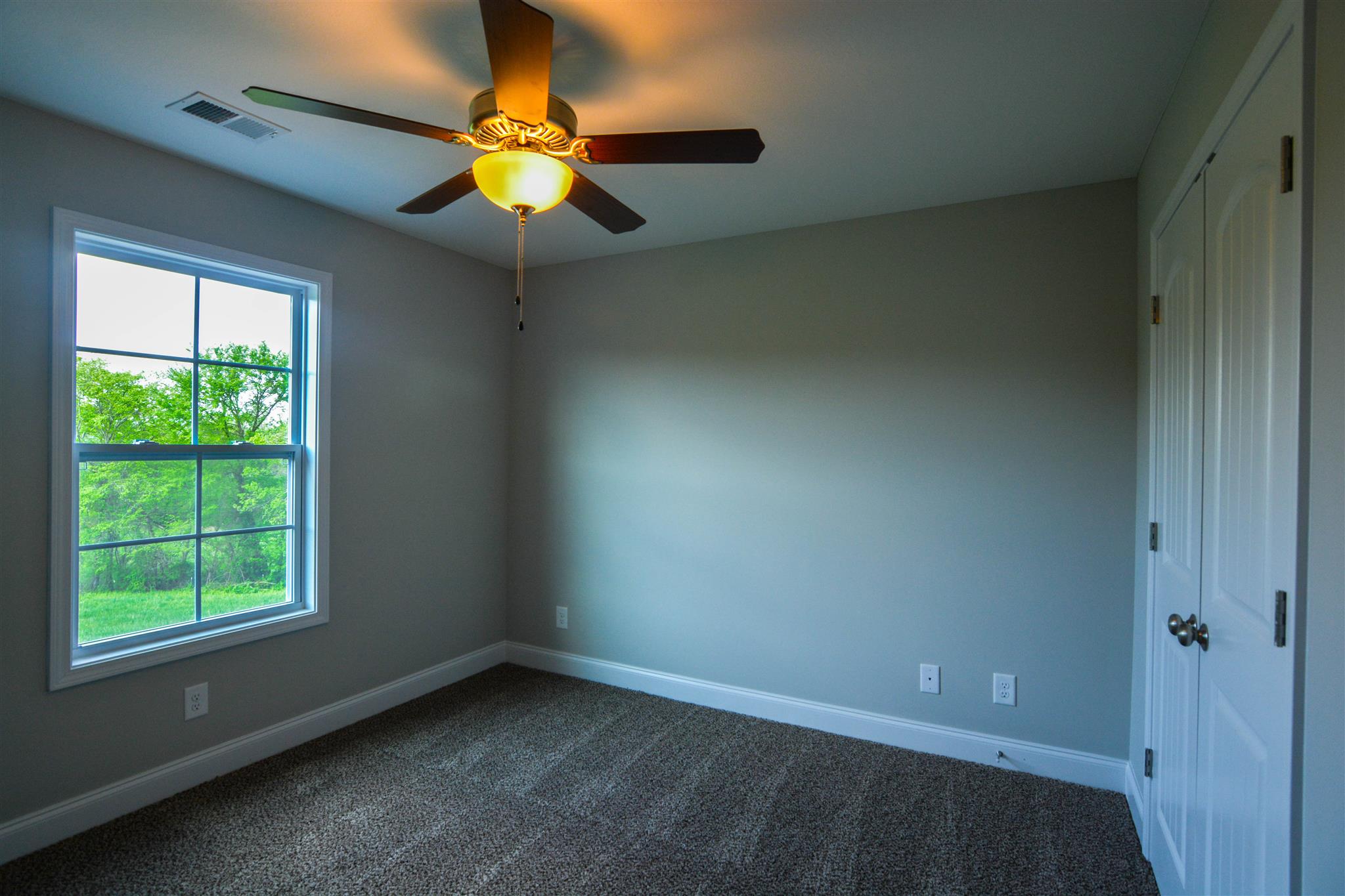 780 Grays Chapel Road Southside, TN 37171 - Photo 25 of 30 an empty room with a window