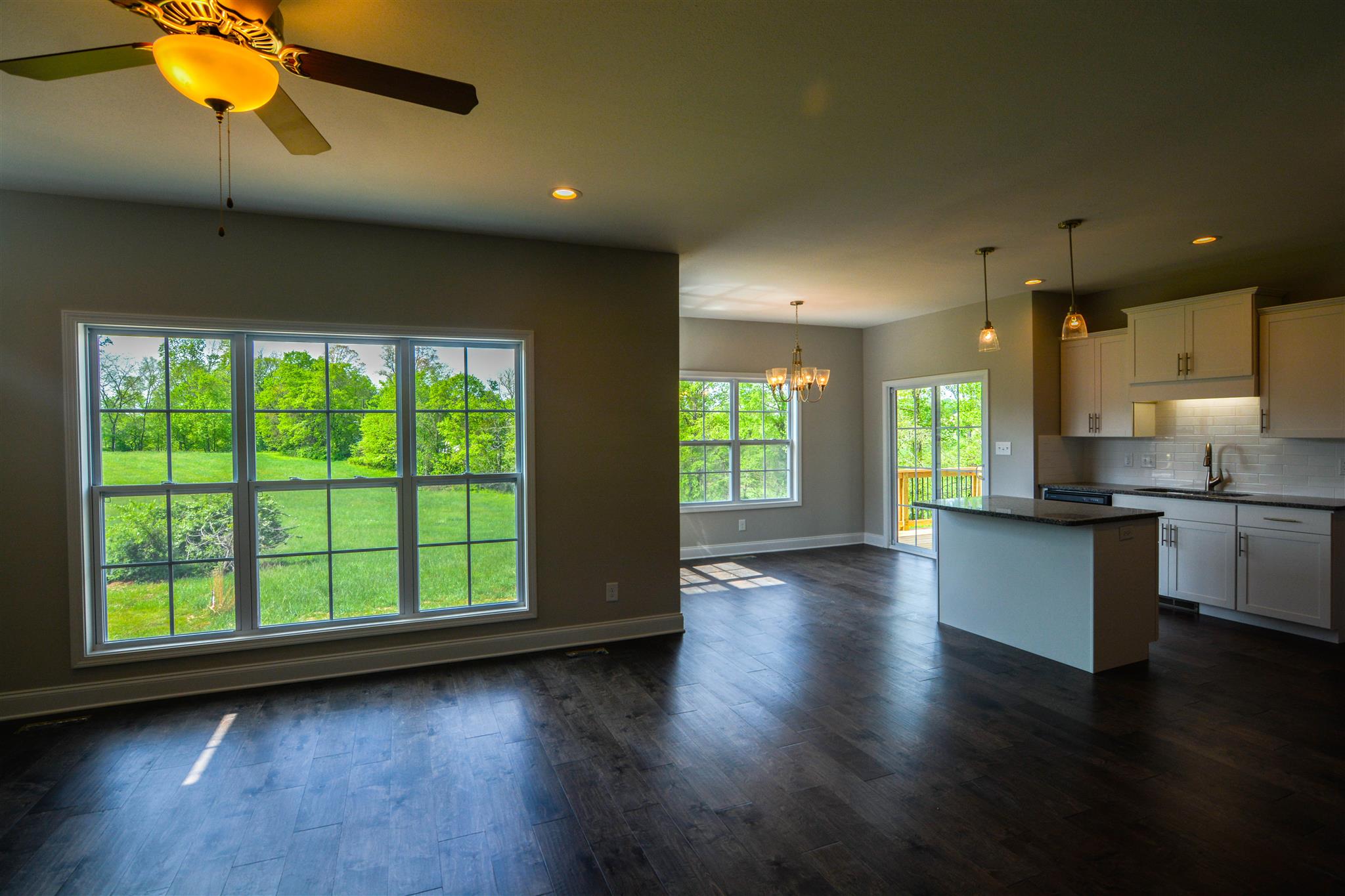 780 Grays Chapel Road Southside, TN 37171 - Photo 5 of 30 a view of a kitchen with a stove and wooden floor