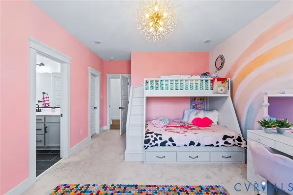 a bathroom with a bathtub sink vanity and mirror