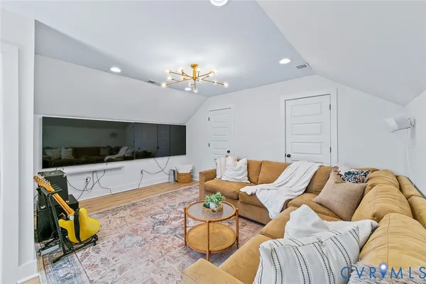 a view of a swimming pool with a garden and plants