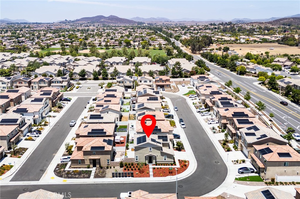 36469 Shine Drive Winchester, CA 92596 - Photo 30 of 73 an aerial view of residential houses with outdoor space