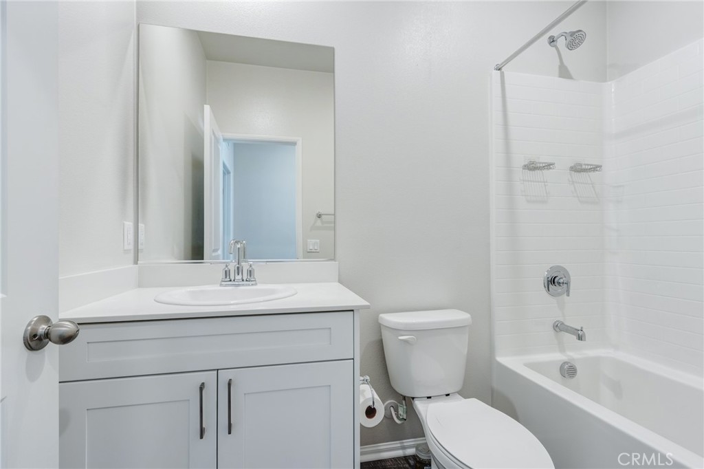 36469 Shine Drive Winchester, CA 92596 - Photo 67 of 73 a bathroom with a toilet sink vanity tub and shower