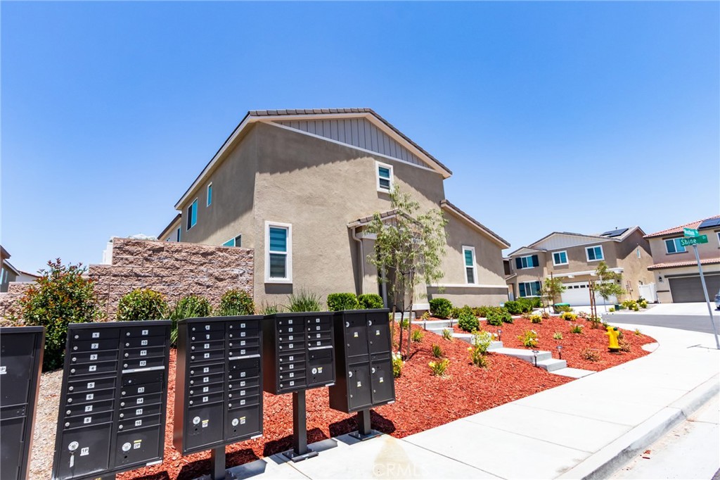 36469 Shine Drive Winchester, CA 92596 - Photo 68 of 73 a front view of a house with large trees