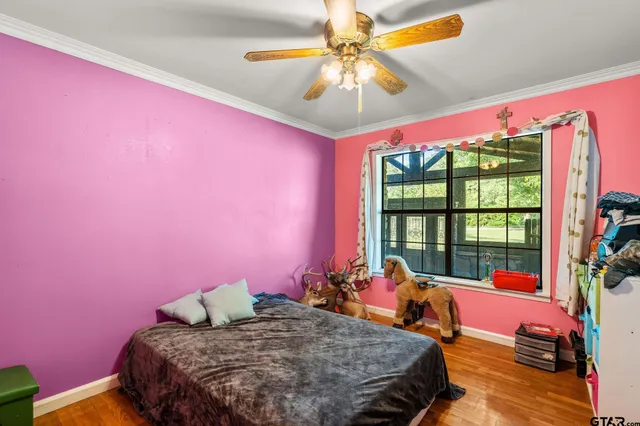 a view of a lake with houses in the background