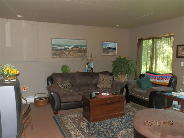 315 Dana Road Barre, MA 01005 - Photo 2 of 6 a living room with furniture and a large window